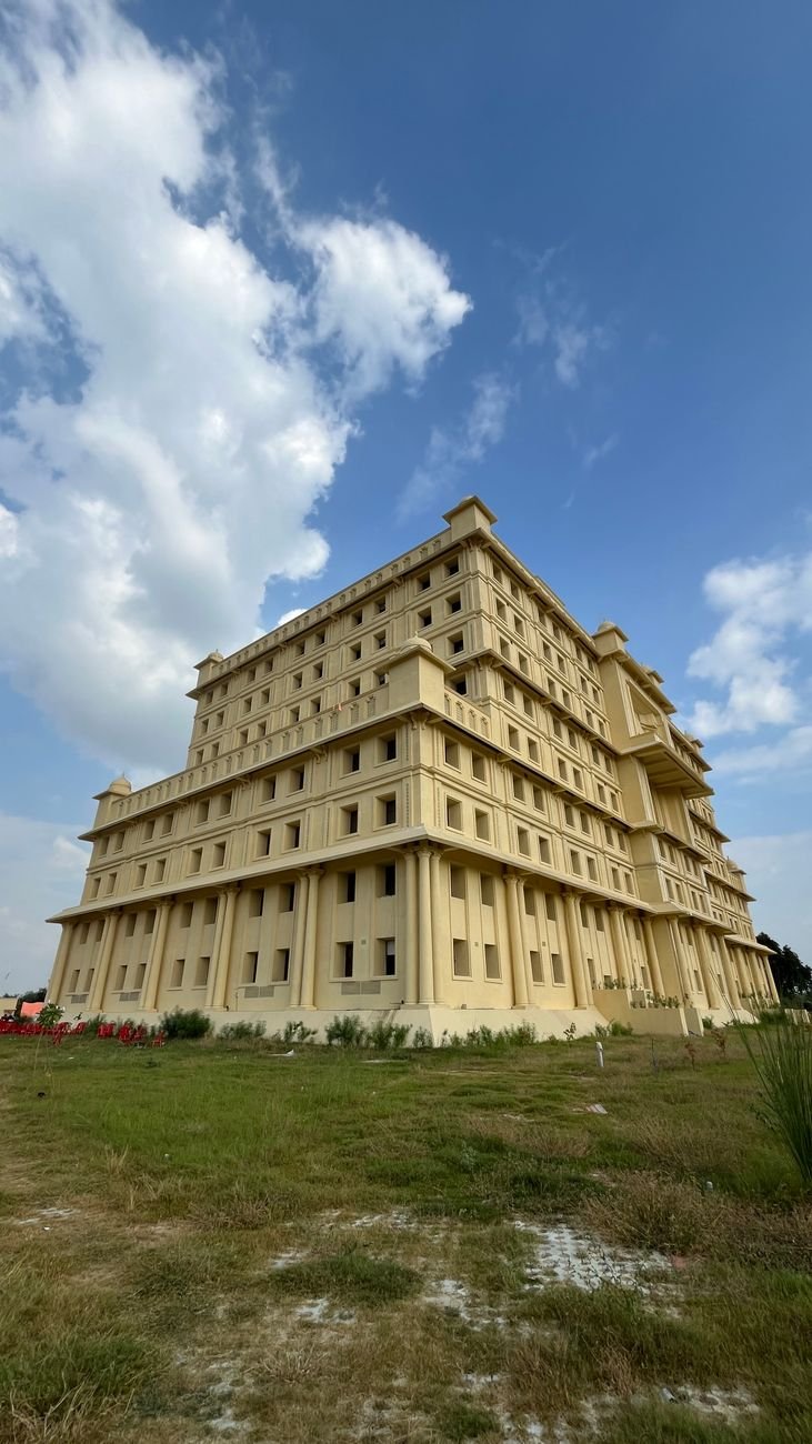 elegant multi storey building against blue sky