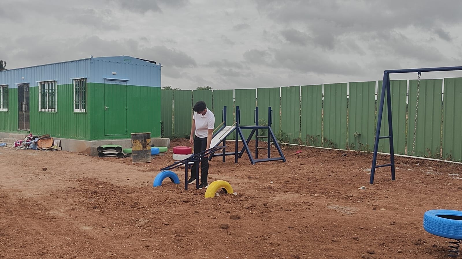 A Class 12 student in Bengaluru has designed a portable classroom inside a shipping container for children who live on construction sites and move often with their parents' work. The first unit is nearing completion.