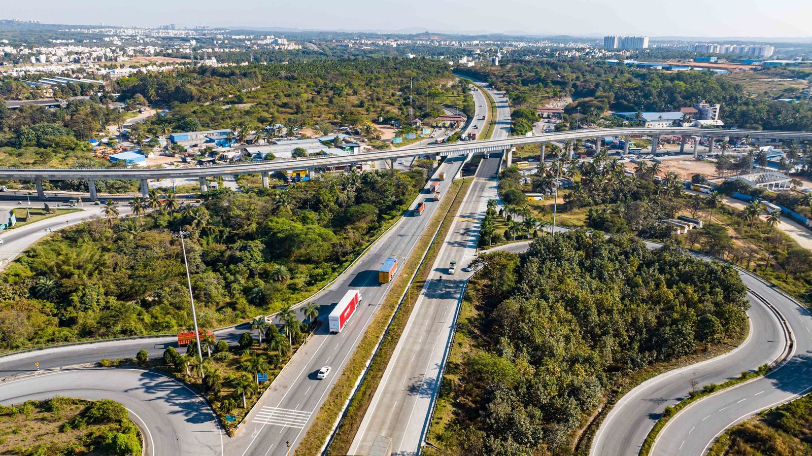 aerial view of busy highway interchange in city