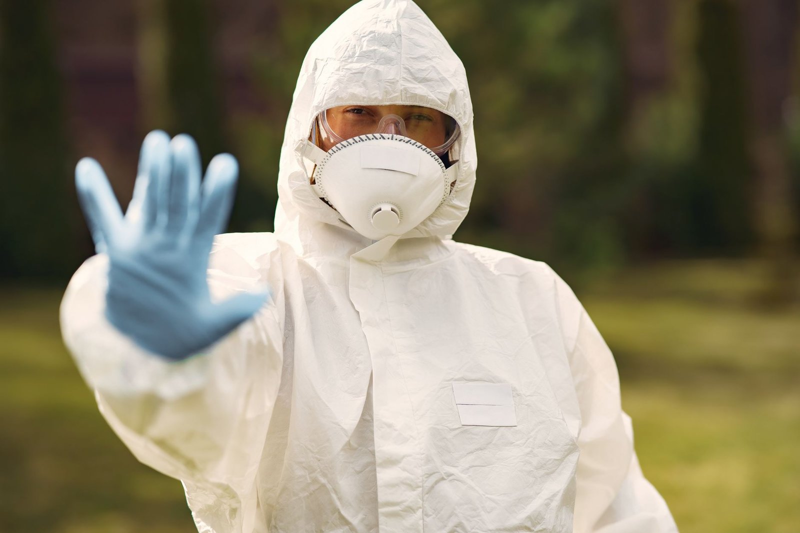 person wearing protective suit