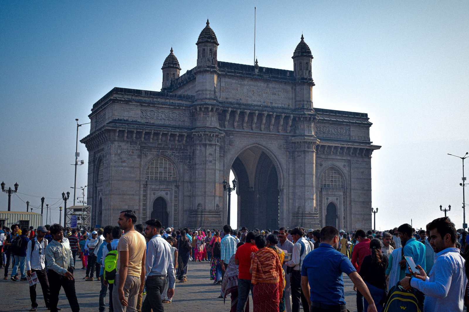 people on square near gateaway to india